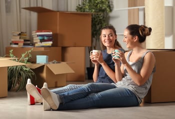 two friends women cup coffee smiling